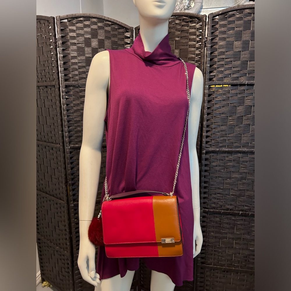 Tina Turk designer red brown leather crossbody handbag with purple fur pom pom